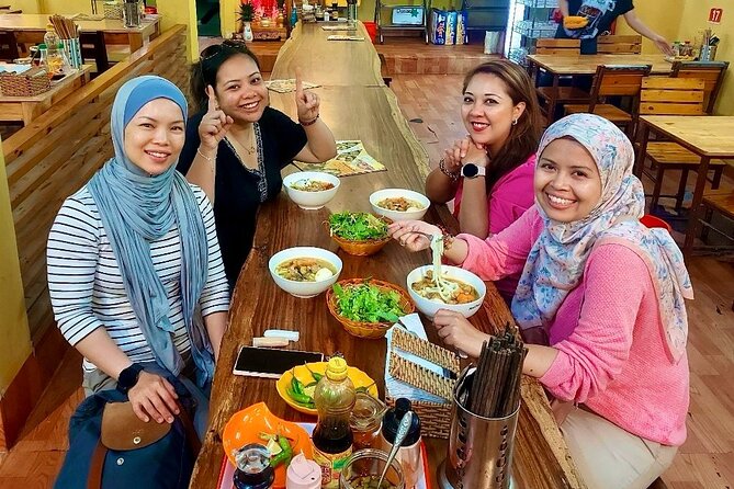 Da Nang Local Food Tour by Motorbike + Sightseeing SAFE & FUN - Dragon Bridge and the coastal drive: sights first, then snacks