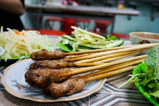Da Nang Night Foodie Tour City and Han River Cruise By Private - Love Bridge at sunset: the photo stop that also sets the mood
