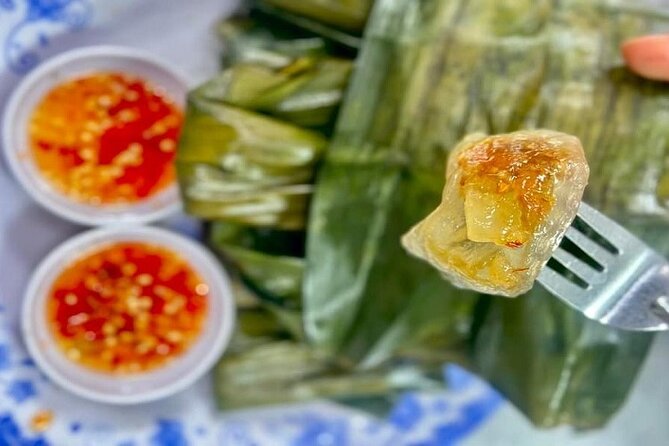 Da Nang Night Foodie Tour City and Han River Cruise By Private - The Ao Dai host: what you gain beyond walking to landmarks