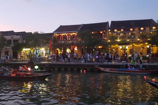 Discover Hoi An Walking Tour, Sampan Boat Ride, Night Market &Colourful Lanterns - Stop 2: Ancient Town walking route with Chinese Assembly Hall, Japanese Bridge, and heritage houses