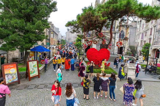 Entry ticket: Ba Na Hills and Golden Bridge Cable Car - Stepping out at Ba Na Hills: Buddha statue and flower gardens