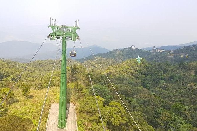 GOLDEN BRIDGE BA NA HILLS - CABLE CAR & Da Nang City PRIVATE TOUR - Marble Mountains: elevator access, caves, and a Buddhist temple visit