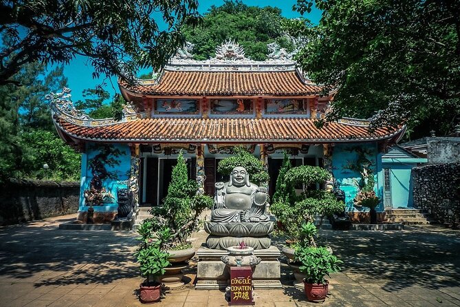 Marble Mountain and Hoi An Ancient Town Tour in Vietnam - Hoi An Ancient Town after dark: Japanese Bridge and lantern streets