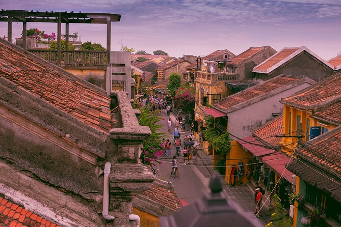 Marble Mountains, Coconut Forest & Hoi An Ancient Town Tour - Bay Mau Coconut Forest: Basket Boat Spinning and Net-Casting